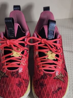 Under Armour Pink and White Athletic Sneaker Label Detail